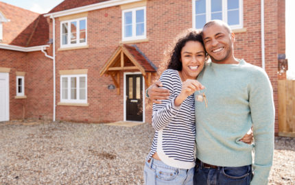 couple with house key